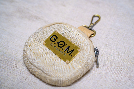 G.O.M.丸型コインケース。